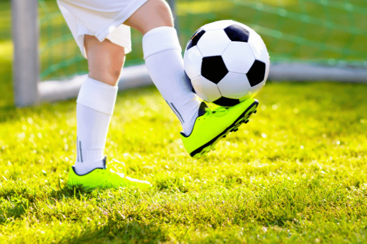 Close up of a player playing at soccer field